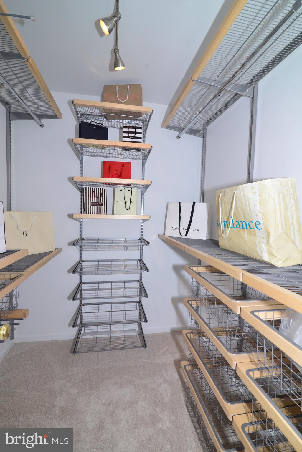 11617 Quail Ridge Court Reston, VA 20194 - Photo 17 of 36 Custom Shelving: Master Walk-In Closet.