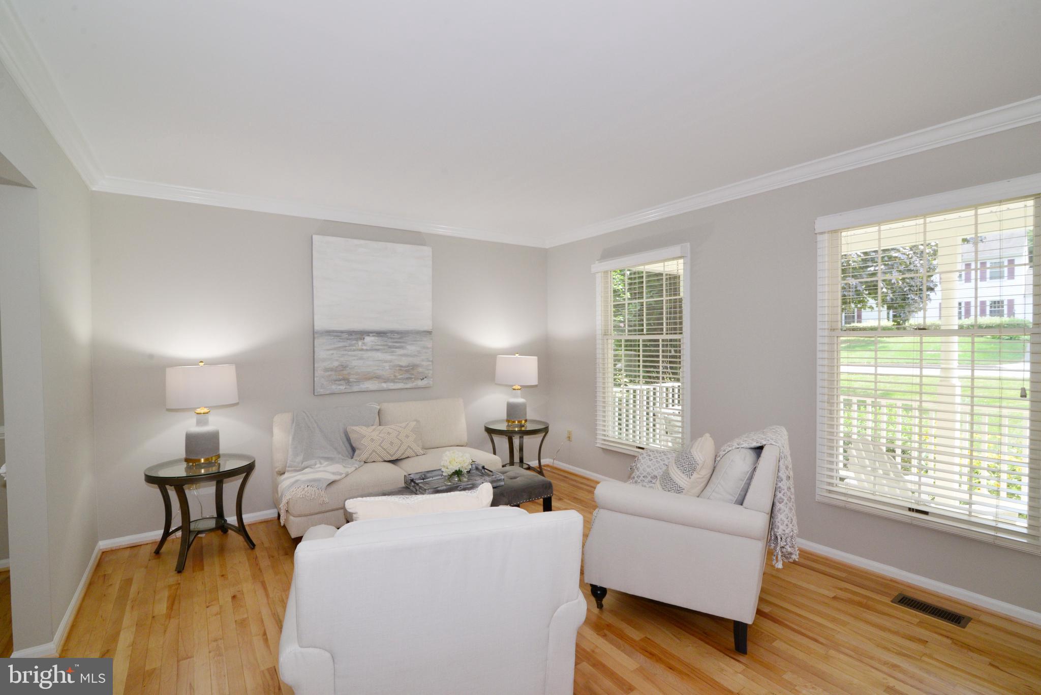 11617 Quail Ridge Court Reston, VA 20194 - Photo 3 of 36 Lovely Living Room with Windows Overlooking Porch.