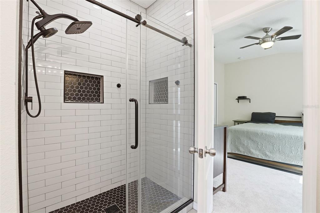 6458 South Goldenrod Road, Unit 29B Orlando, FL 32822 - Photo 22 of 40 a bathroom with a shower