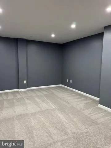 a view of a backyard with swimming pool