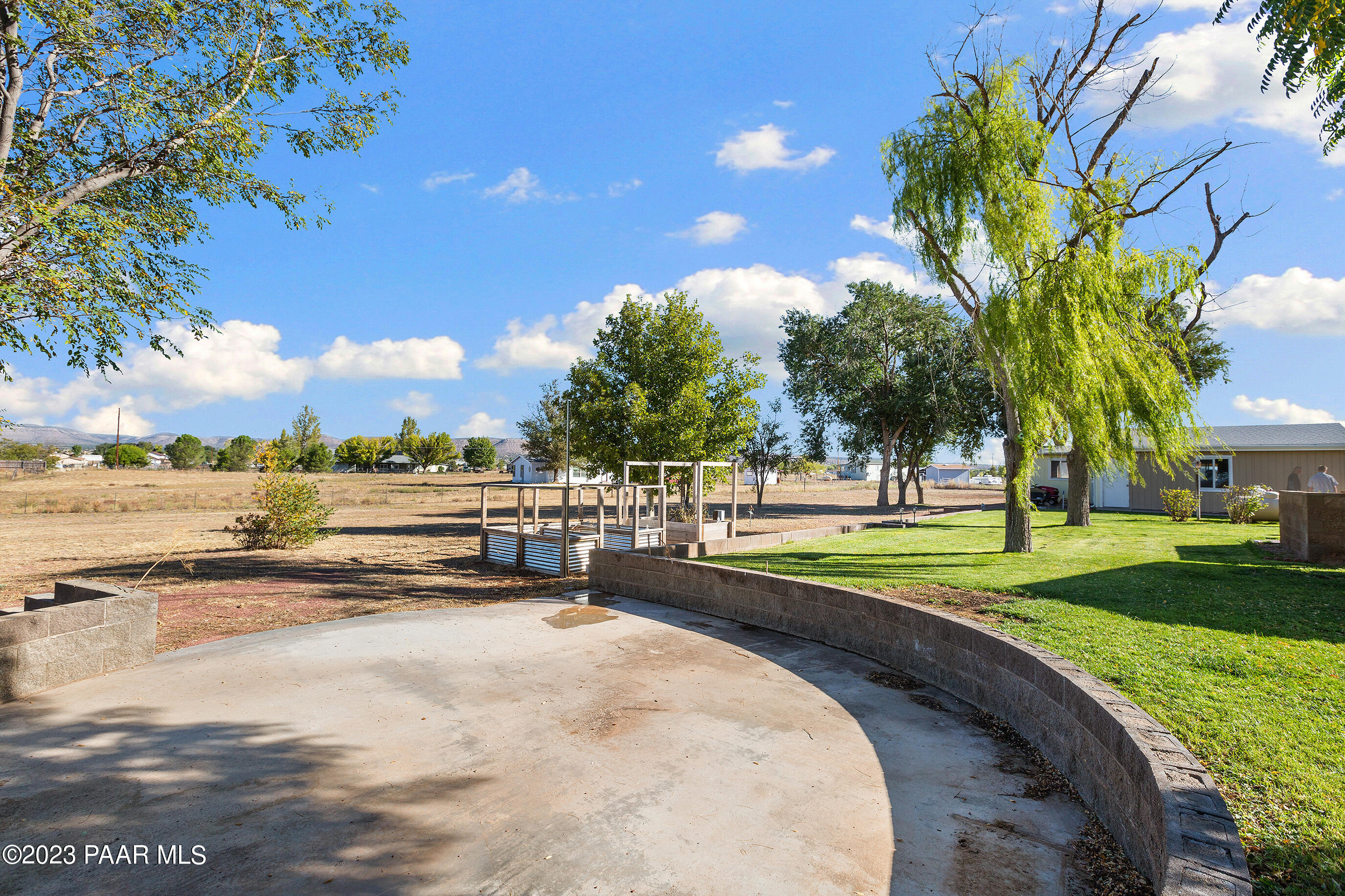 1240 Saddle Road Paulden, AZ 86334 - Photo 13 of 40 a view of a swimming pool and a yard