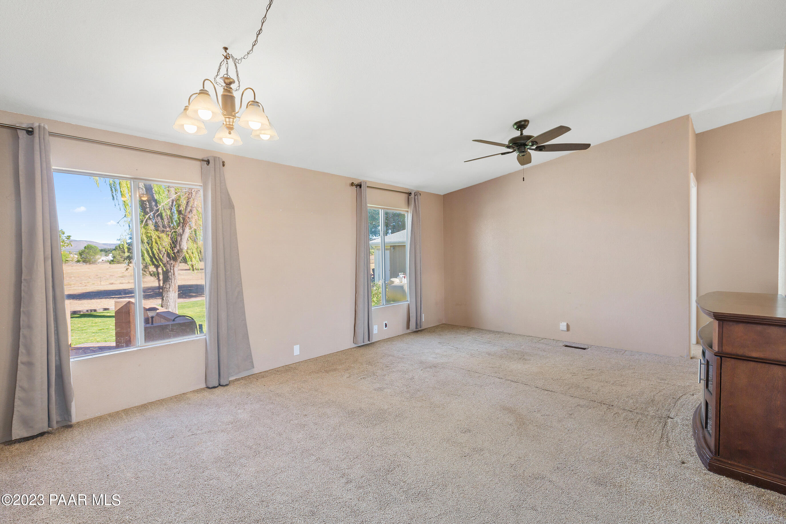 1240 Saddle Road Paulden, AZ 86334 - Photo 16 of 40 a view of an empty room with a window