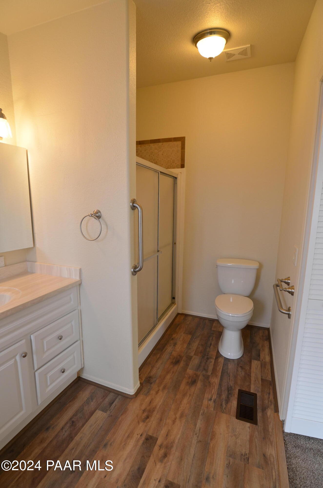 1240 Saddle Road Paulden, AZ 86334 - Photo 26 of 40 a bathroom with a sink and a toilet
