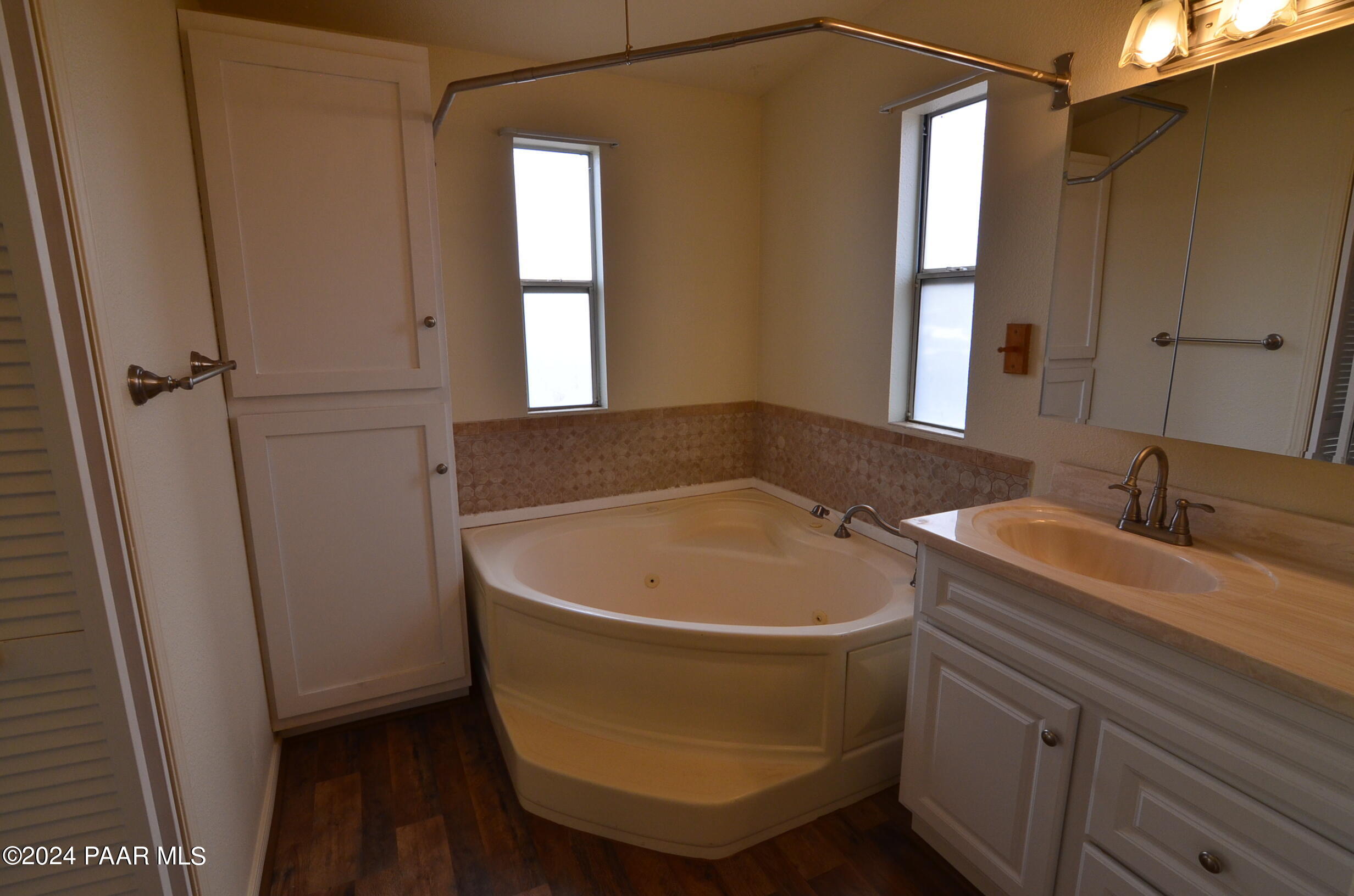 1240 Saddle Road Paulden, AZ 86334 - Photo 27 of 40 a bathroom with a sink and a bathtub