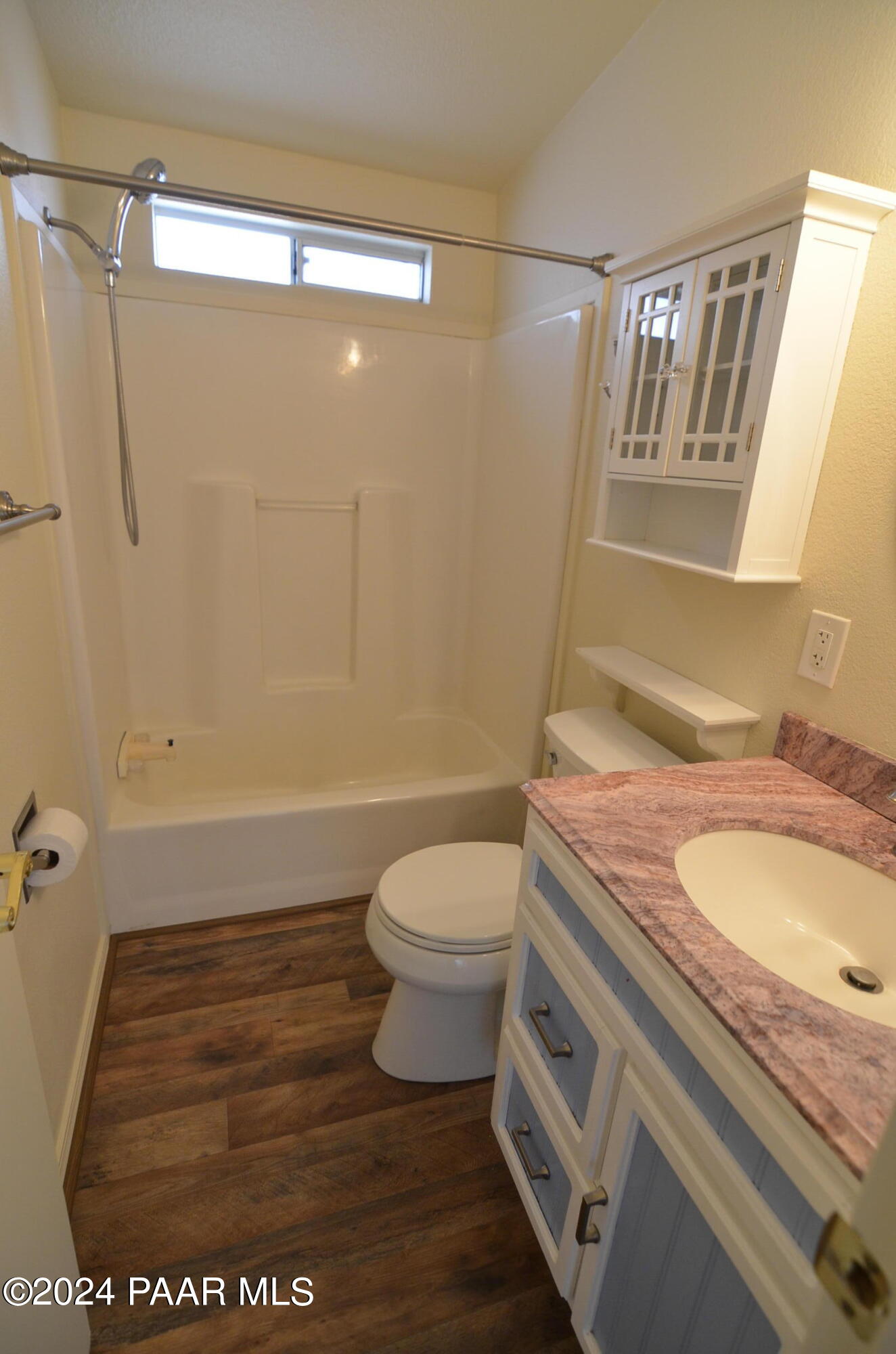 1240 Saddle Road Paulden, AZ 86334 - Photo 28 of 40 a bathroom with a granite countertop sink toilet and shower