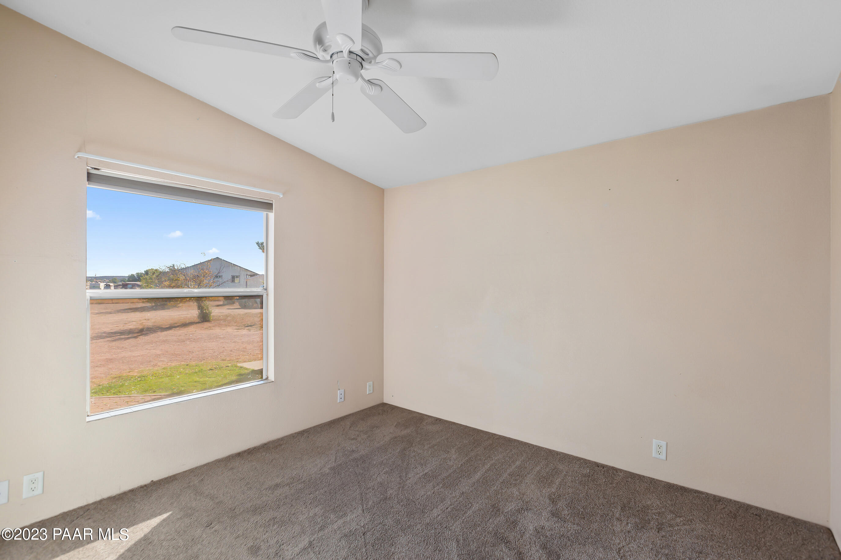 1240 Saddle Road Paulden, AZ 86334 - Photo 29 of 40 a view of an empty room and window