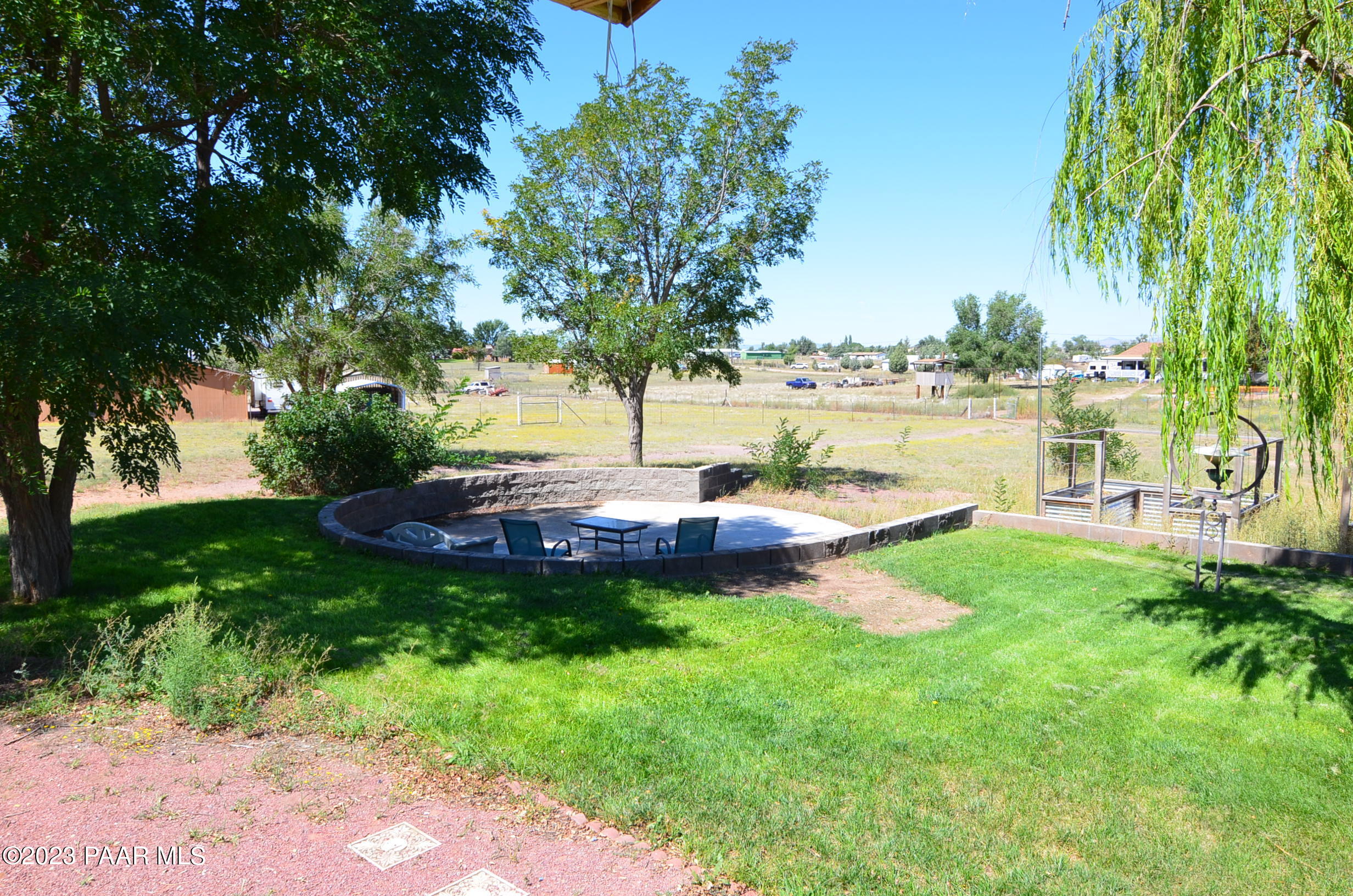 1240 Saddle Road Paulden, AZ 86334 - Photo 32 of 40 a view of a lake with a big yard