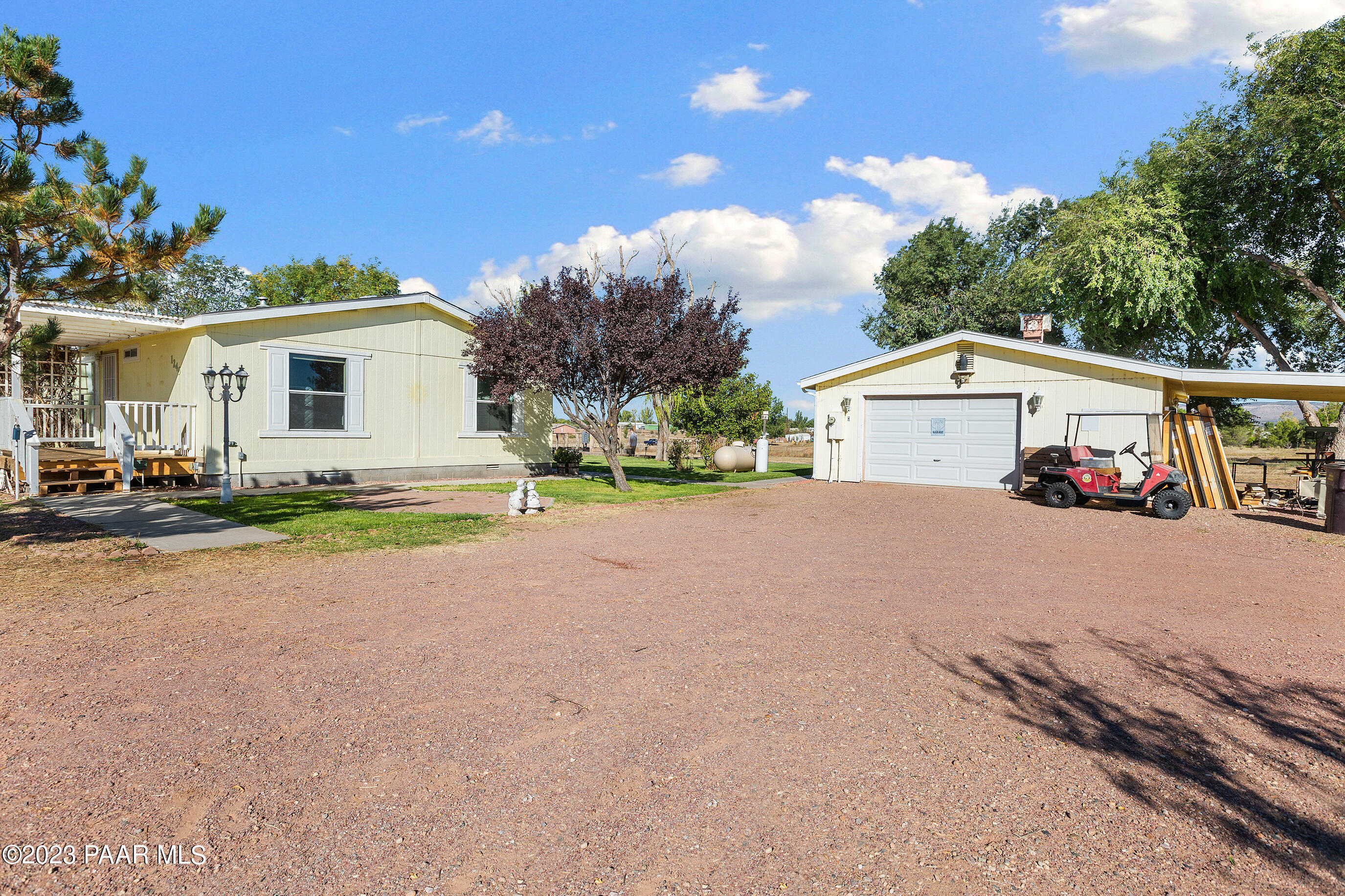 1240 Saddle Road Paulden, AZ 86334 - Photo 6 of 40 a view of a house with a yard