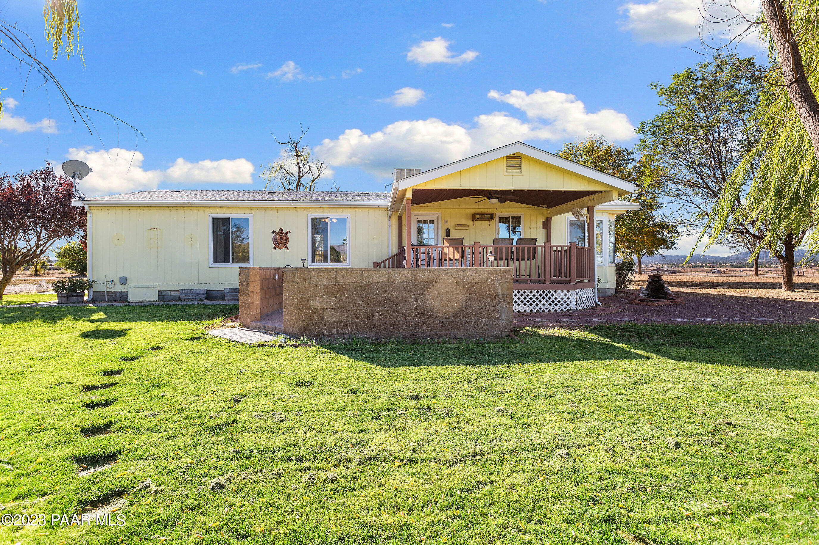 1240 Saddle Road Paulden, AZ 86334 - Photo 7 of 40 a view of a house with backyard and garden