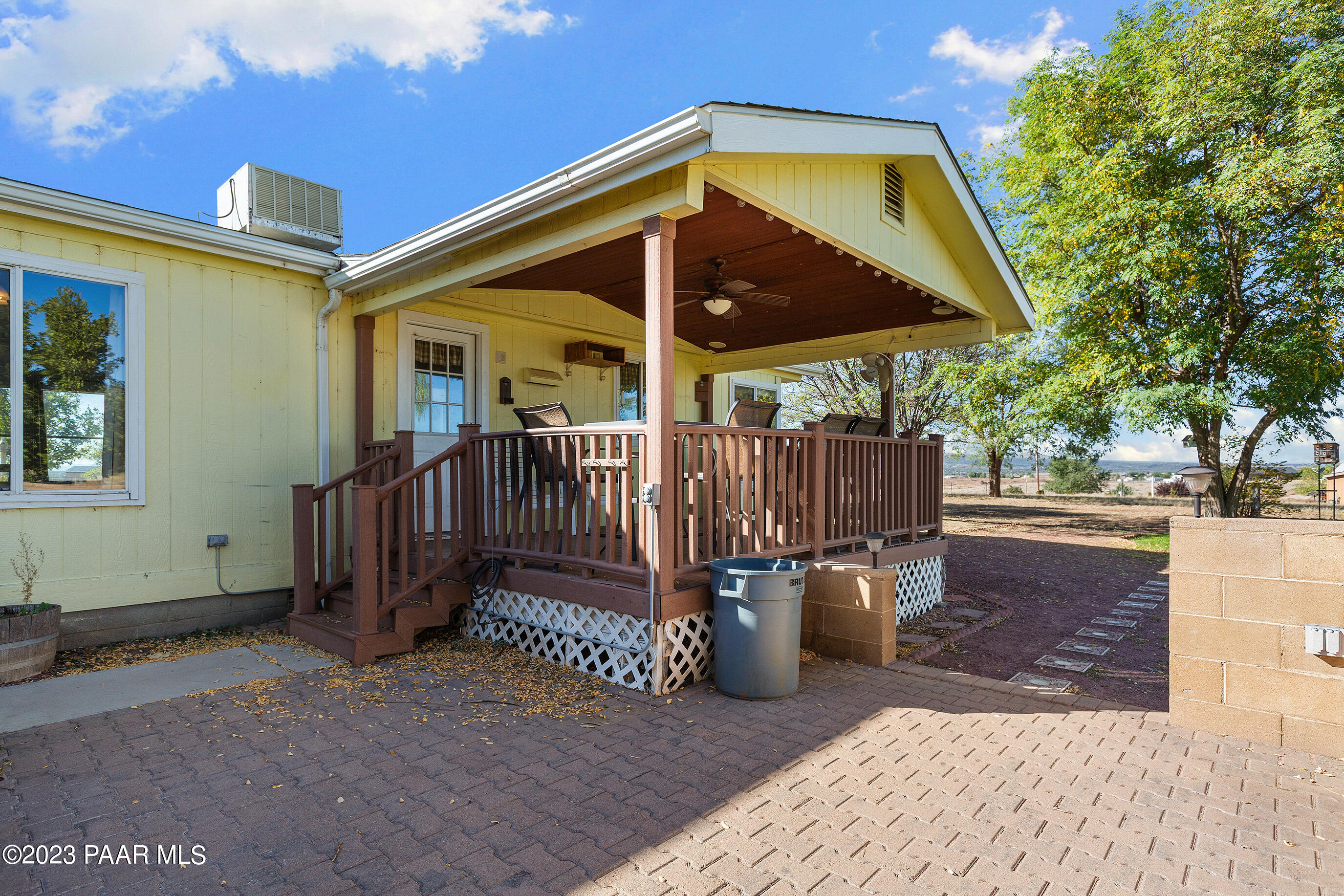 1240 Saddle Road Paulden, AZ 86334 - Photo 8 of 40 a view of a backyard with wooden floor and fence