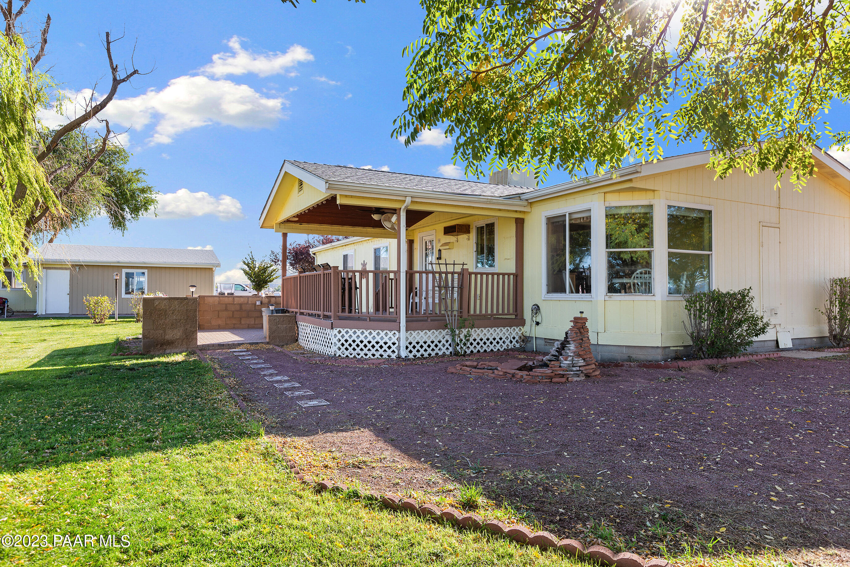 1240 Saddle Road Paulden, AZ 86334 - Photo 9 of 40 a view of a house with a yard