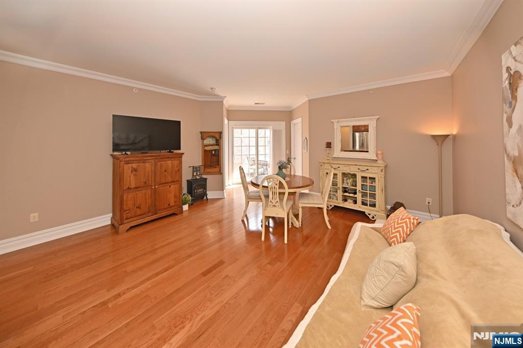 2303 Rio Vista Lane Northvale, NJ 07647 - Photo 11 of 30 a living room with furniture and a flat screen tv