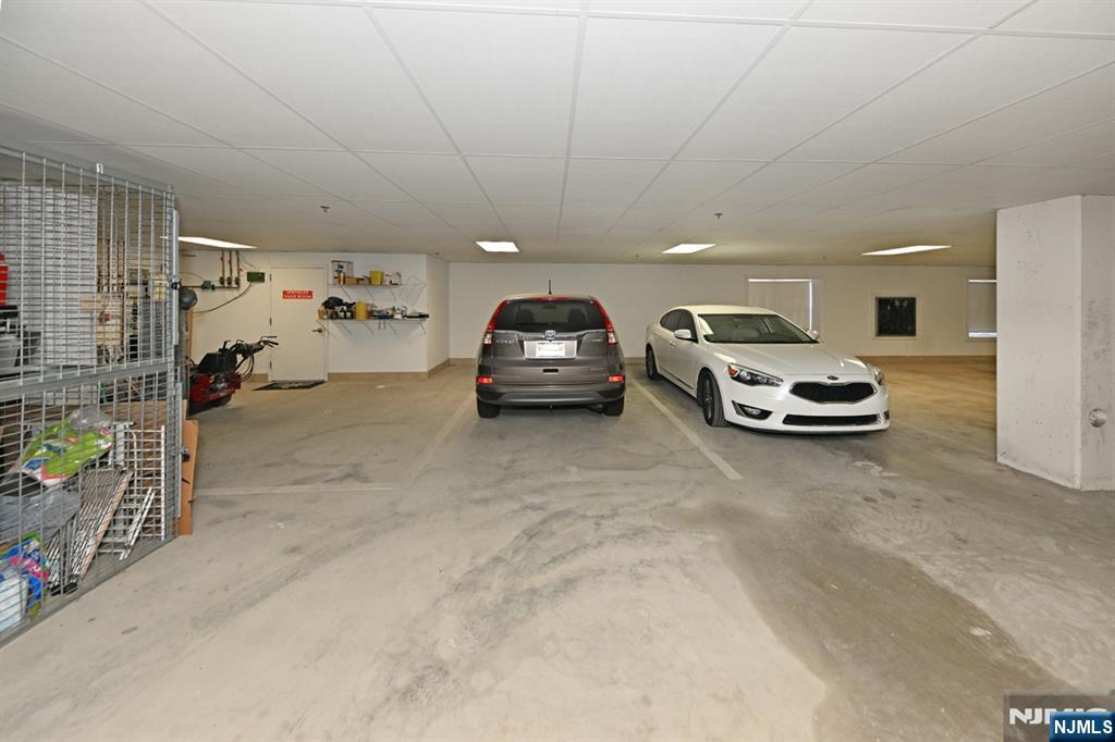 2303 Rio Vista Lane Northvale, NJ 07647 - Photo 18 of 30 a car parked in parking