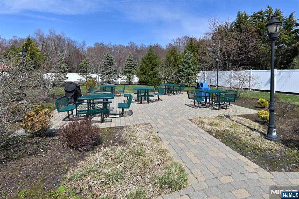 2303 Rio Vista Lane Northvale, NJ 07647 - Photo 22 of 30 a view of a outdoor space with furniture and trees