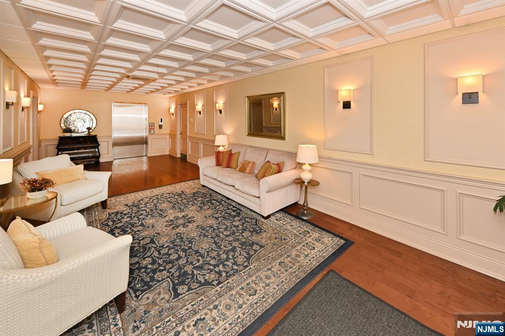 2303 Rio Vista Lane Northvale, NJ 07647 - Photo 5 of 30 a living room with furniture and a chandelier