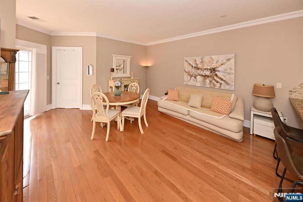 2303 Rio Vista Lane Northvale, NJ 07647 - Photo 10 of 30 a living room with furniture and a wooden floor