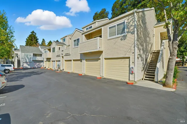 a view of a house with a street