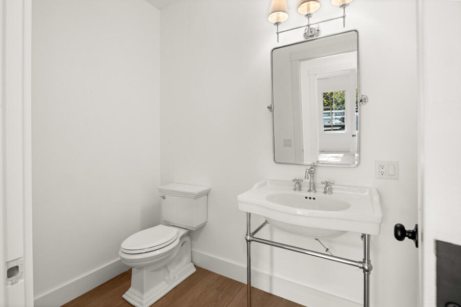 34 Davis Street Vineyard Haven, MA 02568 - Photo 12 of 26 a bathroom with a sink mirror and toilet