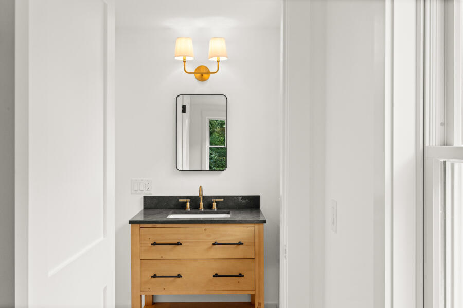 34 Davis Street Vineyard Haven, MA 02568 - Photo 23 of 26 a bathroom with a sink and a mirror