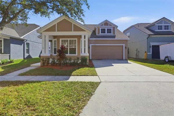 front view of a house with a yard