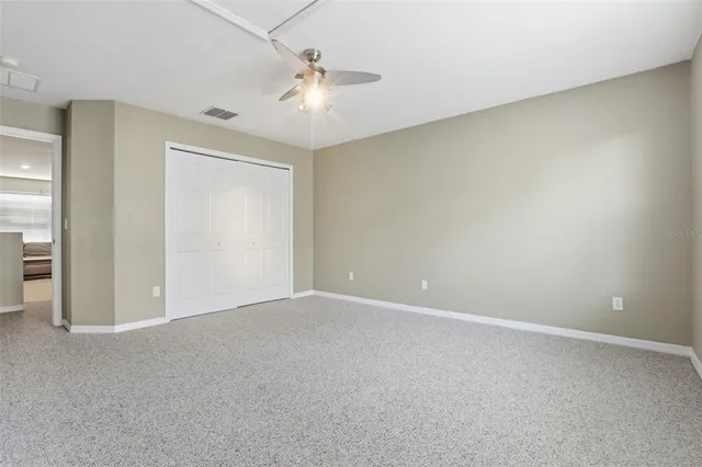 an aerial view of a house with yard