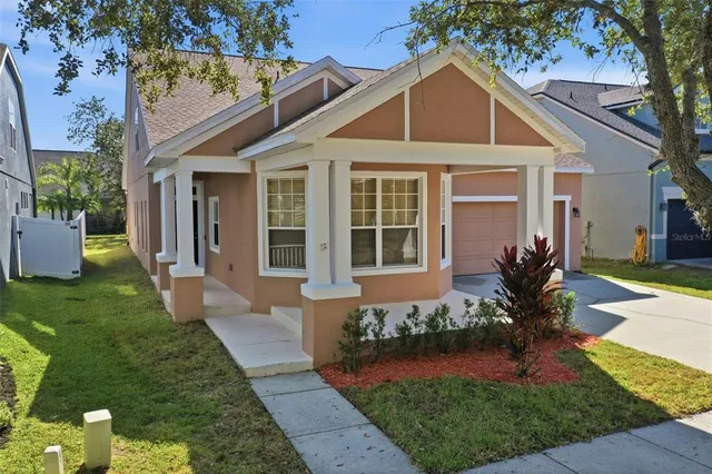a view of a street with tall buildings
