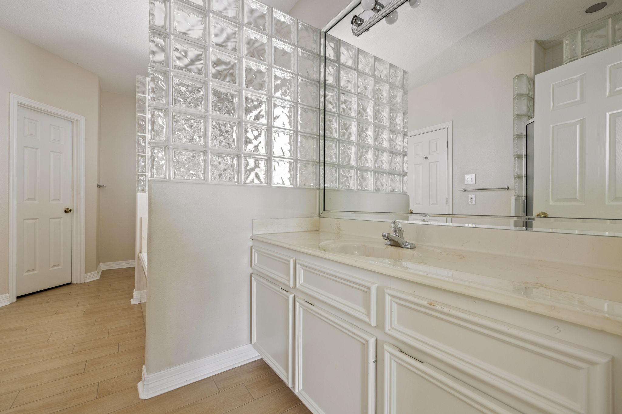 8022 Duffield Lane Houston, TX 77071 - Photo 11 of 19 a bathroom with a sink and a mirror