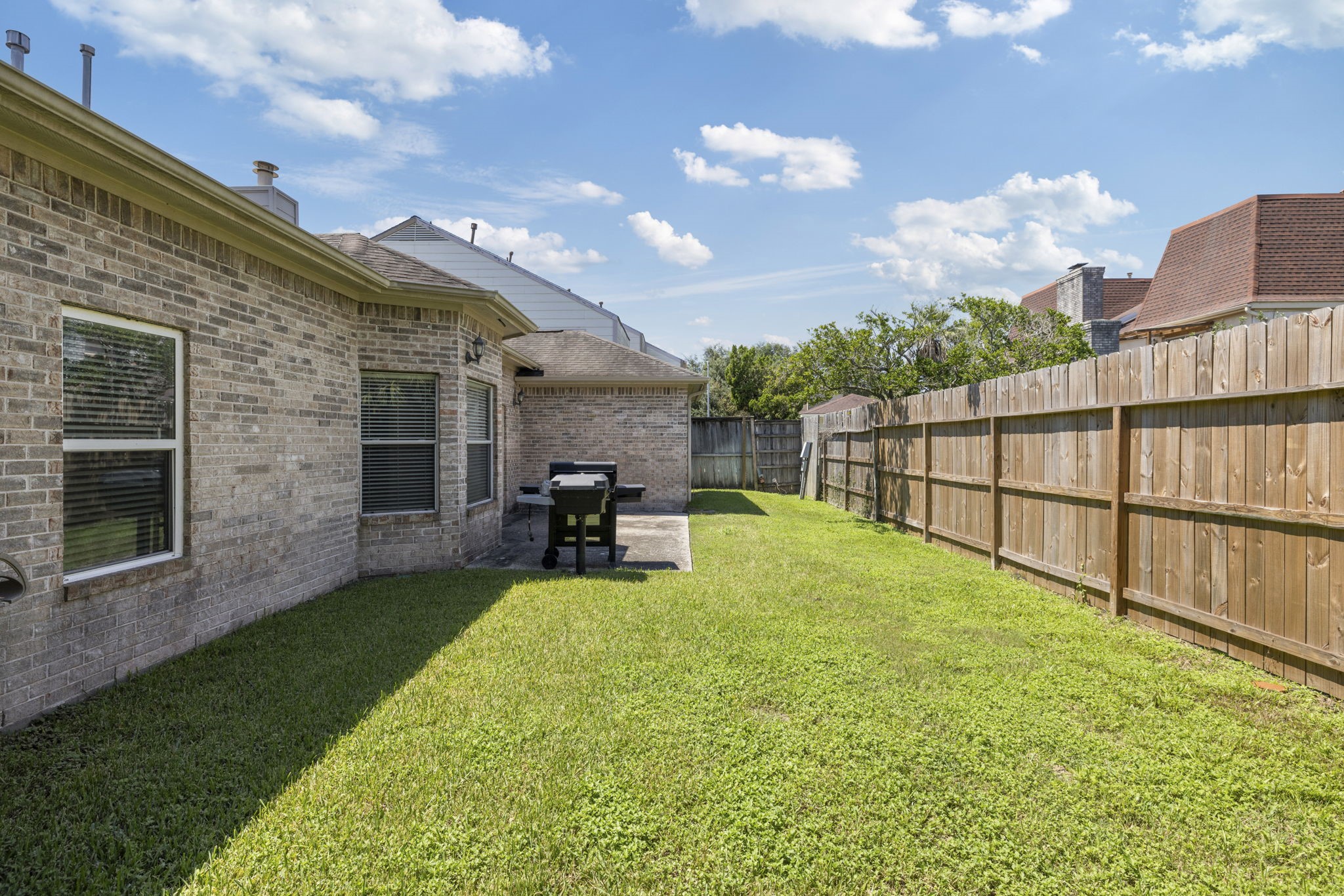 8022 Duffield Lane Houston, TX 77071 - Photo 17 of 19 a view of a backyard with sitting area