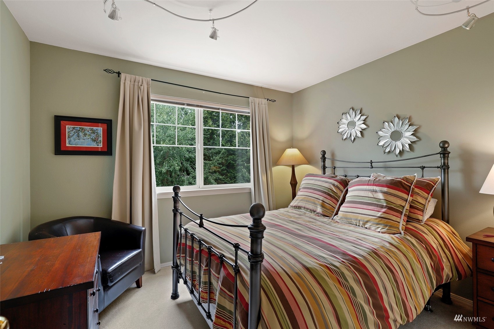 4620 Northeast 6th Place Renton, WA 98059 - Photo 29 of 38 a bedroom with a bed and a window
