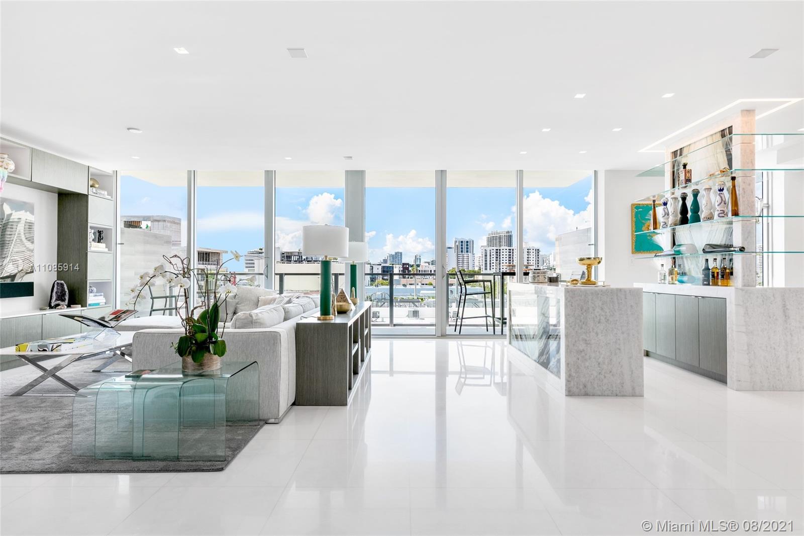 1201 20th Street, Unit PH08 Miami Beach, FL 33139 - Photo 12 of 28 a living room with furniture and a view of kitchen