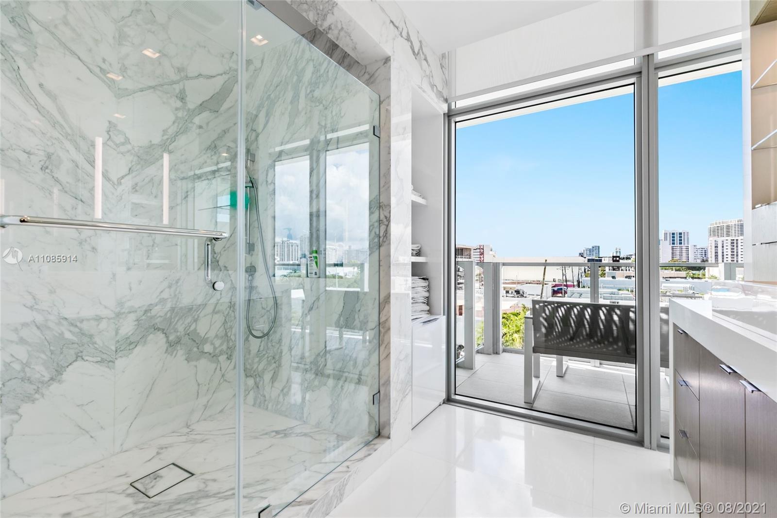 1201 20th Street, Unit PH08 Miami Beach, FL 33139 - Photo 16 of 28 a bathroom with a shower