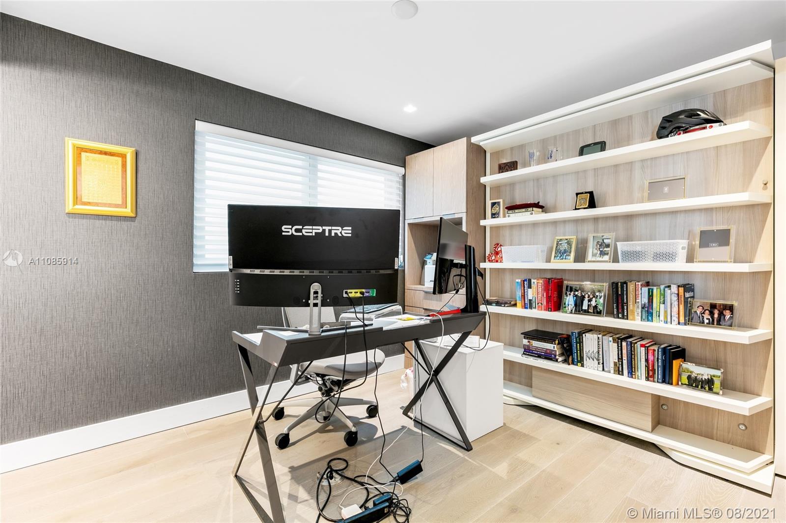 1201 20th Street, Unit PH08 Miami Beach, FL 33139 - Photo 22 of 28 a view of a workspace with furniture