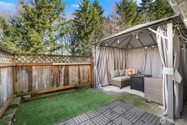 a backyard of a house with seating space