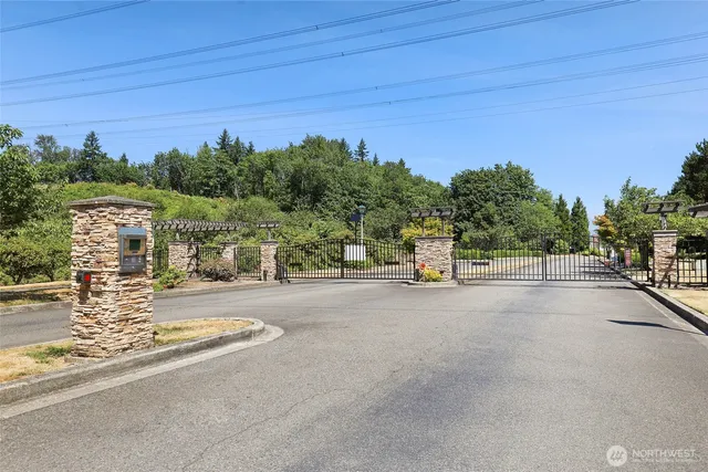 a view of a street with a building in the background