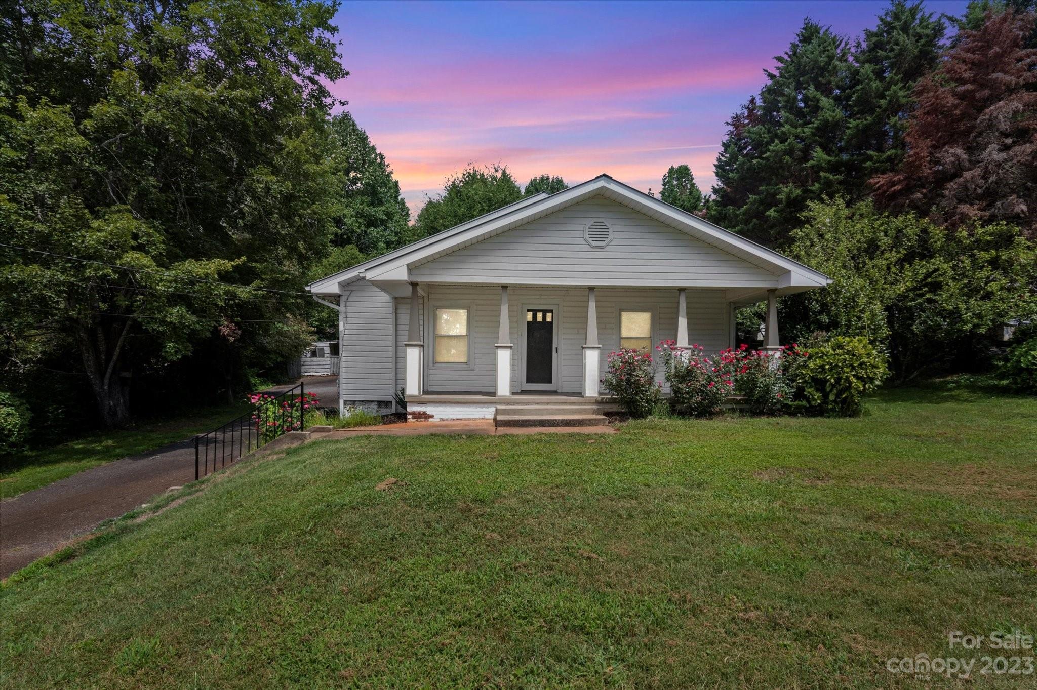 206 West View Street Rutherfordton, NC 28139 - Photo 1 of 39 a front view of a house with a garden