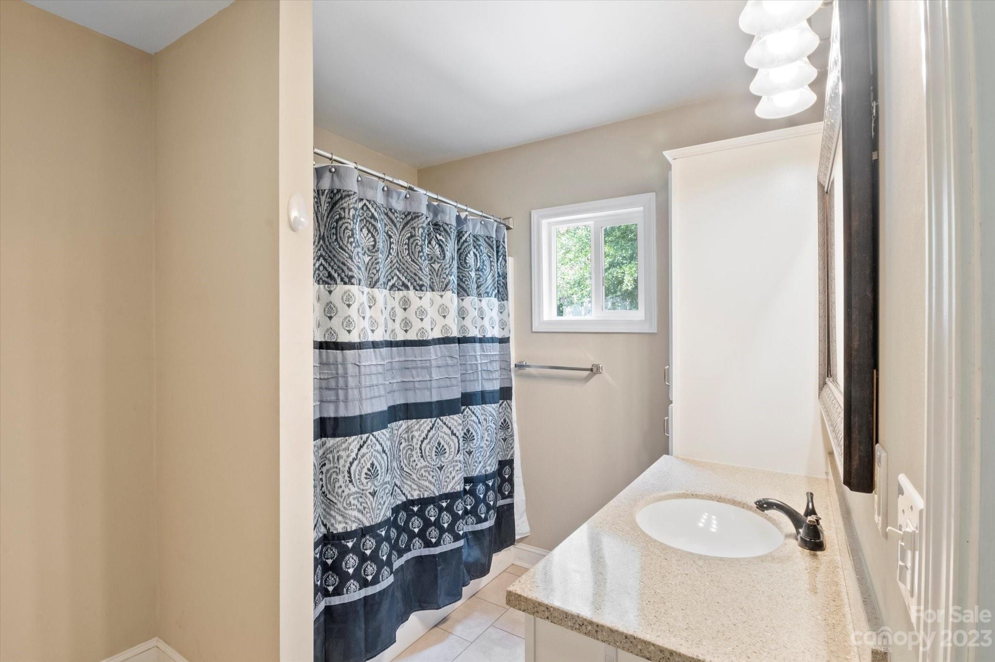 206 West View Street Rutherfordton, NC 28139 - Photo 16 of 39 a bathroom with a sink toilet and shower