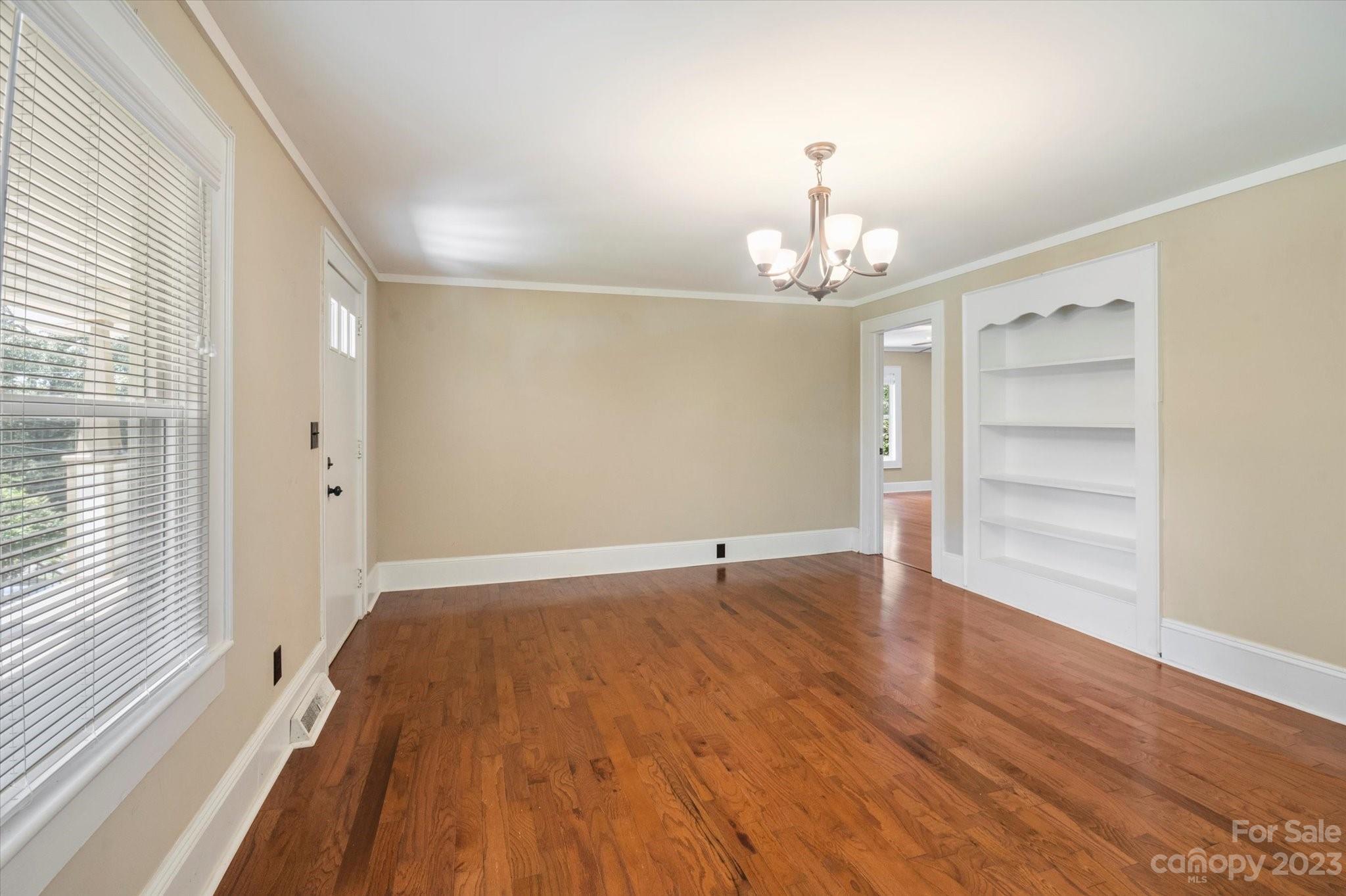 206 West View Street Rutherfordton, NC 28139 - Photo 31 of 39 wooden floor in an empty room with a window