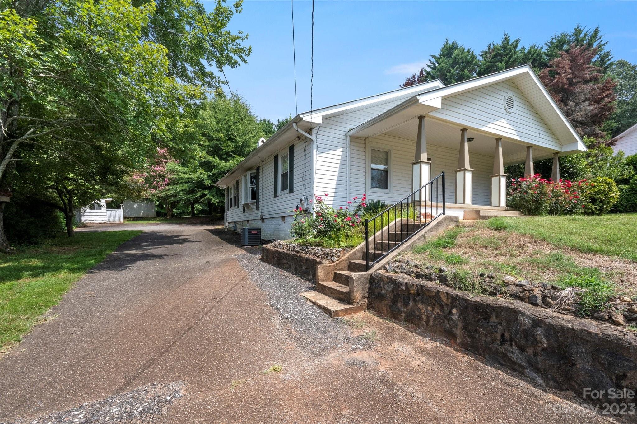 206 West View Street Rutherfordton, NC 28139 - Photo 35 of 39 a front view of a house with garden