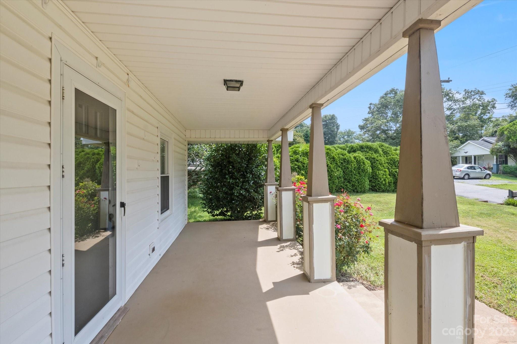 206 West View Street Rutherfordton, NC 28139 - Photo 39 of 39 a view of a porch with a furniture and floor to ceiling window