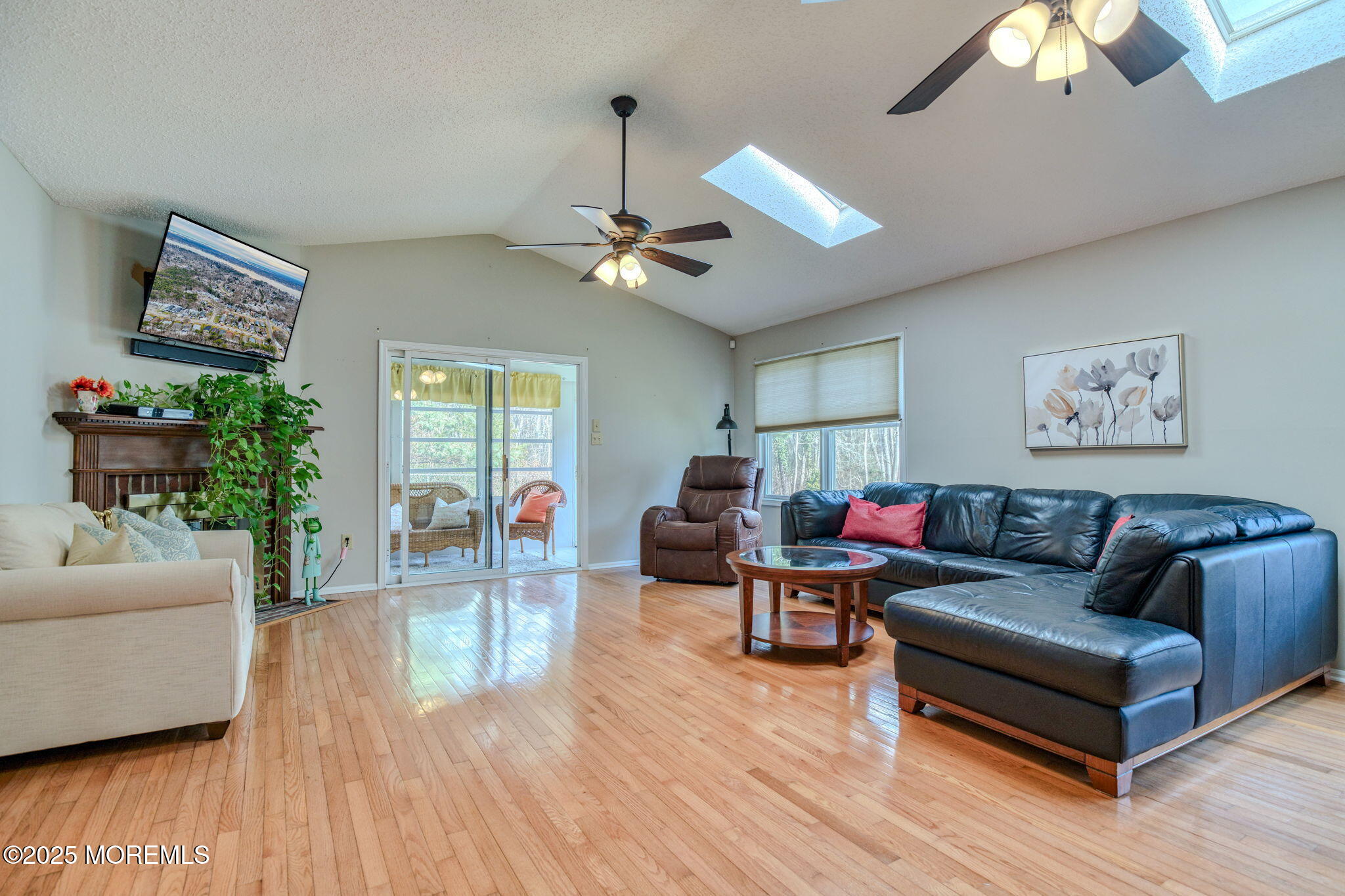 16 Deer Run Lane Brick, NJ 08724 - Photo 13 of 41 a living room with furniture and a wooden floor