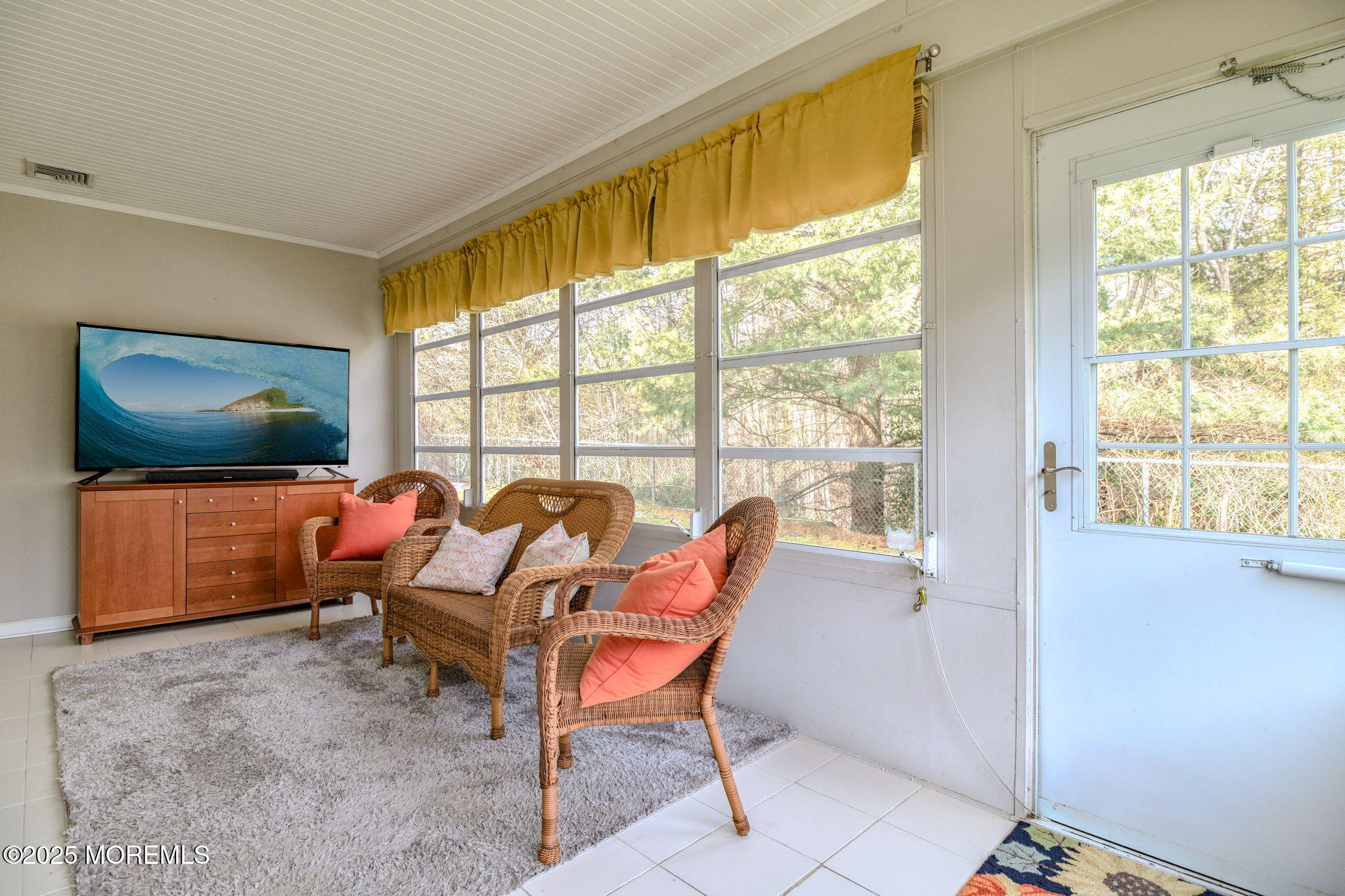 16 Deer Run Lane Brick, NJ 08724 - Photo 15 of 41 a living room with furniture and a flat screen tv