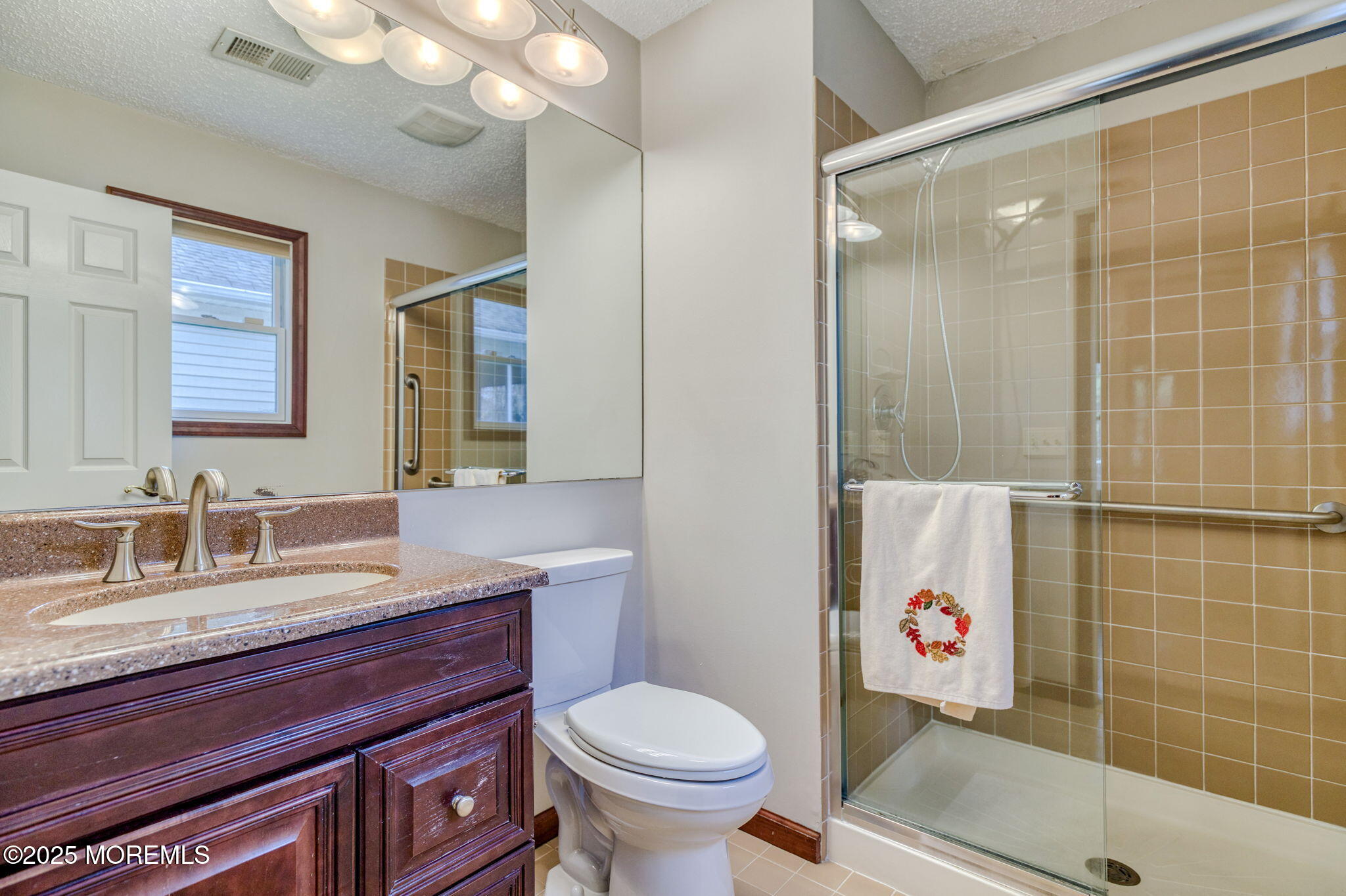 16 Deer Run Lane Brick, NJ 08724 - Photo 25 of 41 a bathroom with a sink toilet and shower