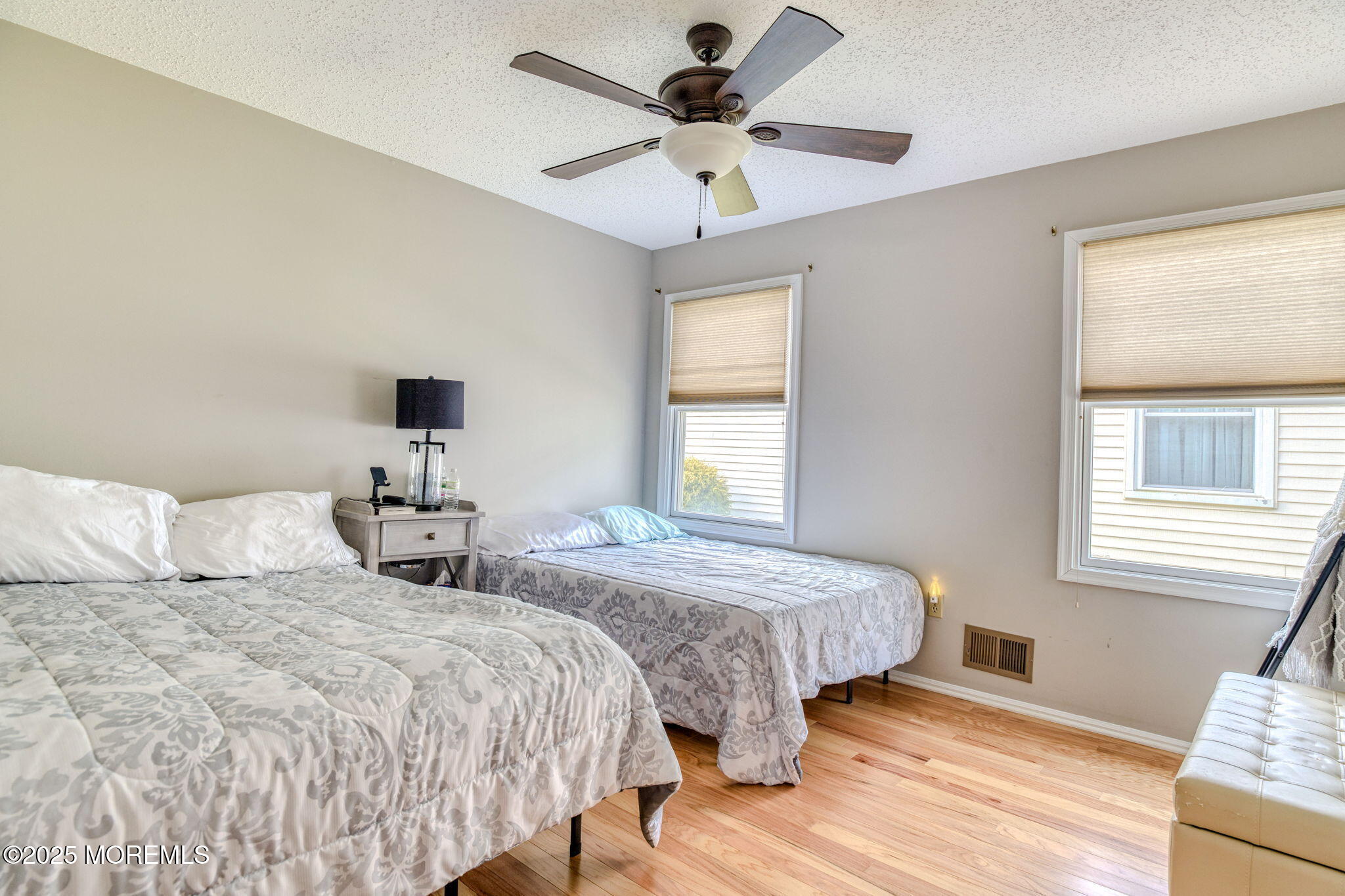 16 Deer Run Lane Brick, NJ 08724 - Photo 27 of 41 a bedroom with two beds and a window