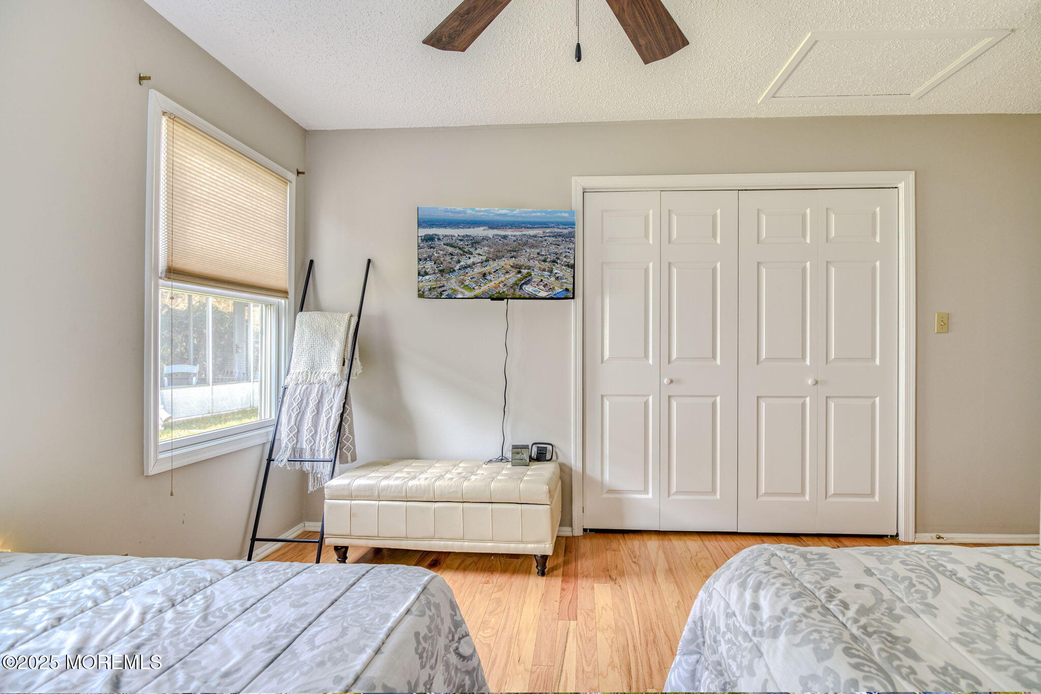16 Deer Run Lane Brick, NJ 08724 - Photo 28 of 41 a bedroom with a bed and a window