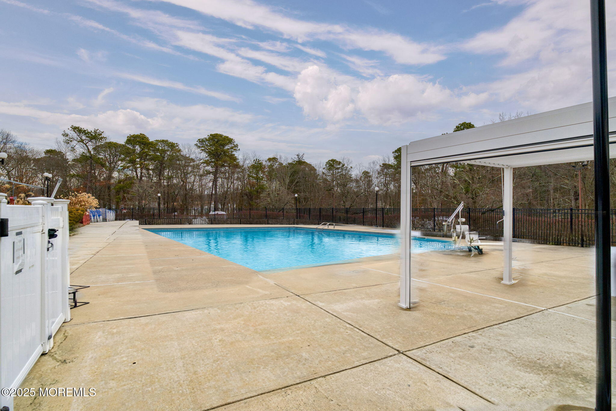 16 Deer Run Lane Brick, NJ 08724 - Photo 38 of 41 a view of a swimming pool with a yard