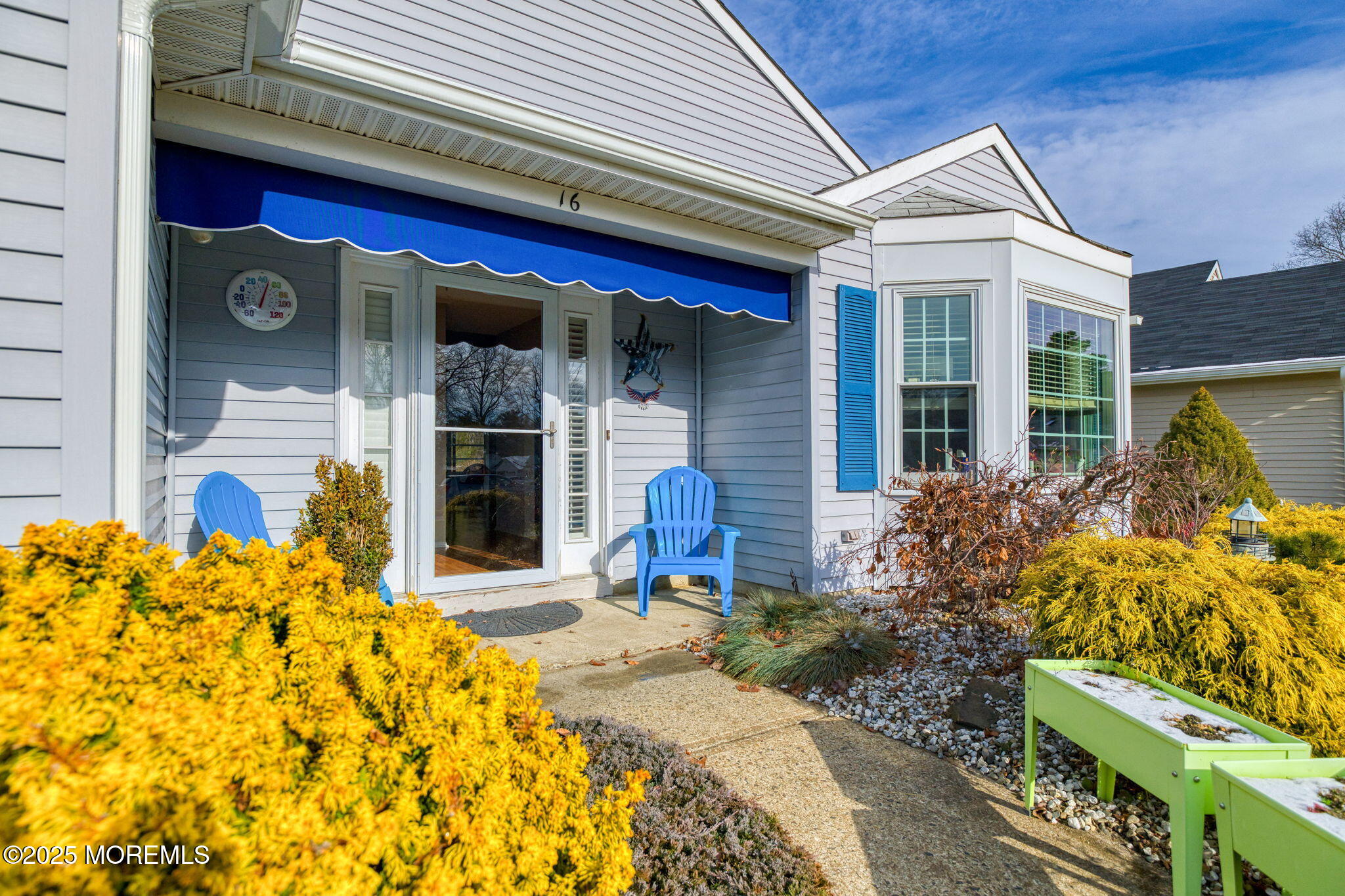 16 Deer Run Lane Brick, NJ 08724 - Photo 4 of 41 a view of a house with potted plants and a table and chair