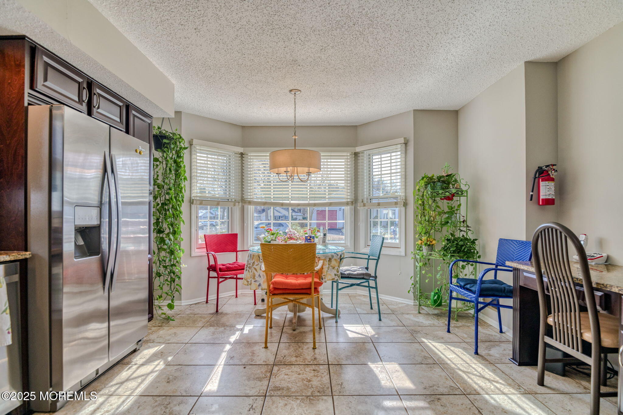 16 Deer Run Lane Brick, NJ 08724 - Photo 7 of 41 a living room filled with furniture and a potted plant