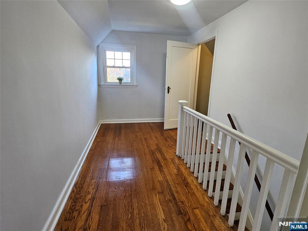 55 Rutgers Place River Edge, NJ 07661 - Photo 13 of 23 a view of hallway with wooden floor