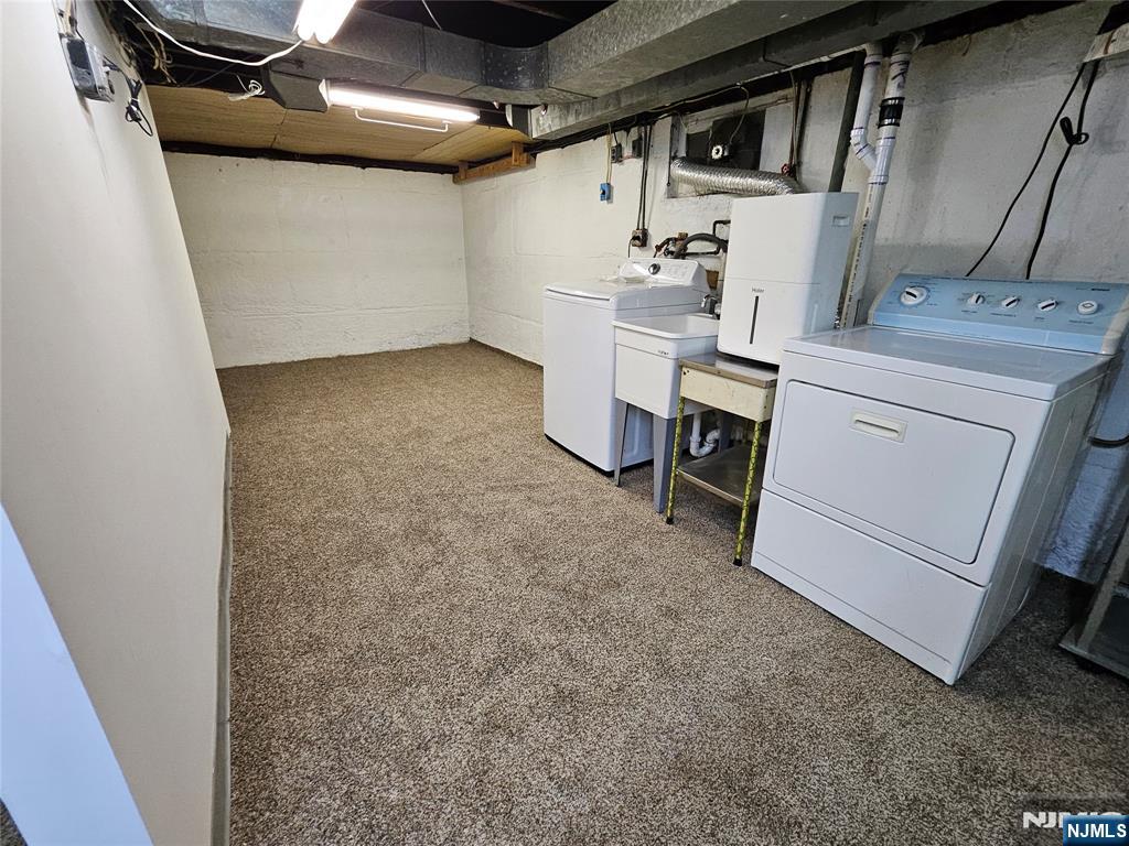 55 Rutgers Place River Edge, NJ 07661 - Photo 18 of 23 a utility room with dryer and washer