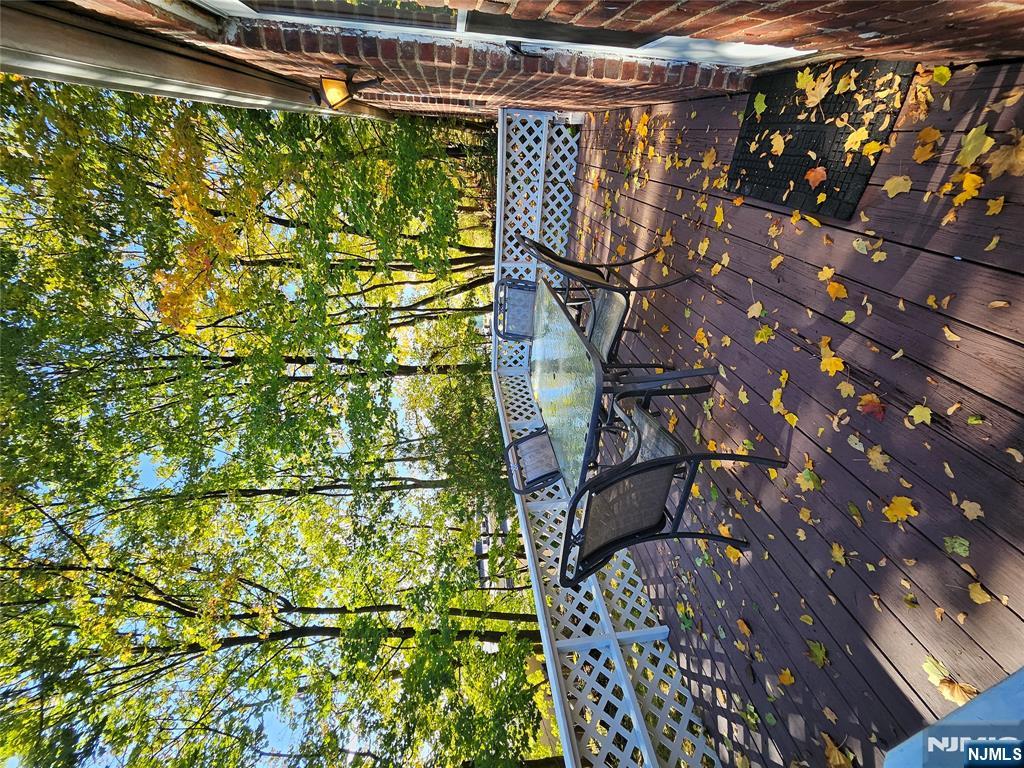 55 Rutgers Place River Edge, NJ 07661 - Photo 20 of 23 a view of a chairs and table on the patio
